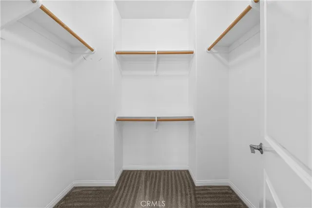 a view of small space with racks on the wall