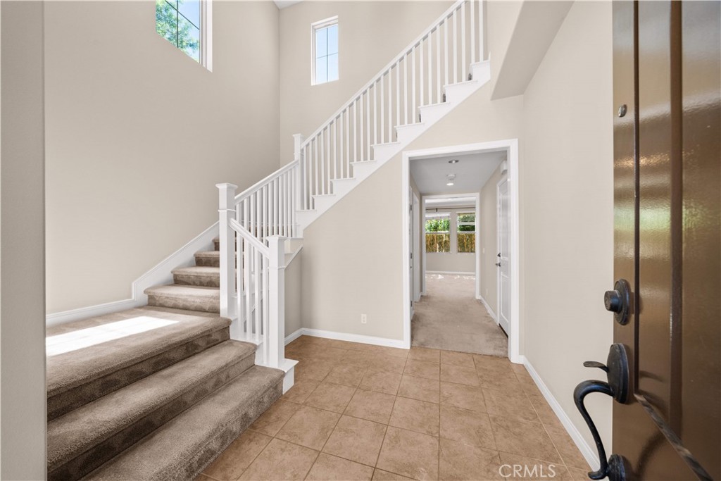 129 Overbrook Irvine, CA 92620 - Photo 5 of 41 a view of hallway with stairs