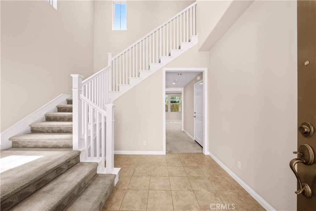 129 Overbrook Irvine, CA 92620 - Photo 6 of 41 a view of entryway and hall with wooden floor
