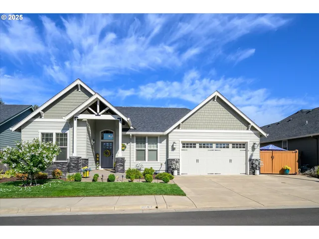 a view of front of house with a yard