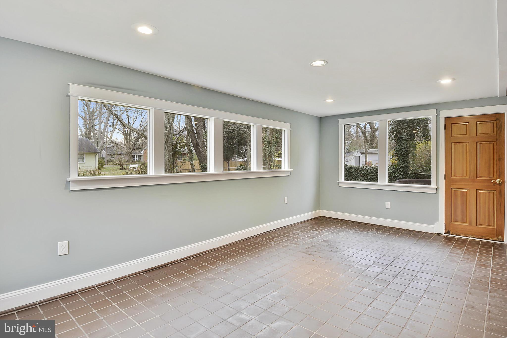 7405 Chatham Street Springfield, VA 22151 - Photo 11 of 30 a view of an empty room with a window
