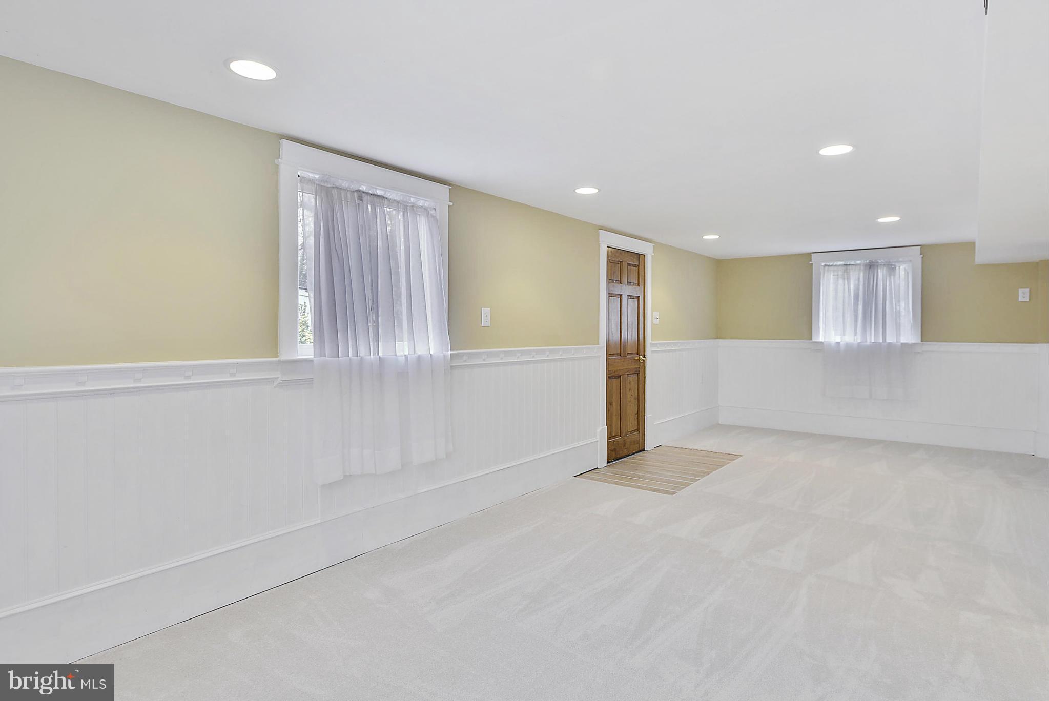 7405 Chatham Street Springfield, VA 22151 - Photo 16 of 30 a view of an empty room with a window