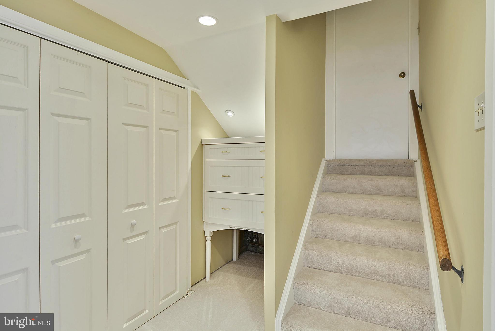 7405 Chatham Street Springfield, VA 22151 - Photo 20 of 30 a view of staircase with white walls and white door