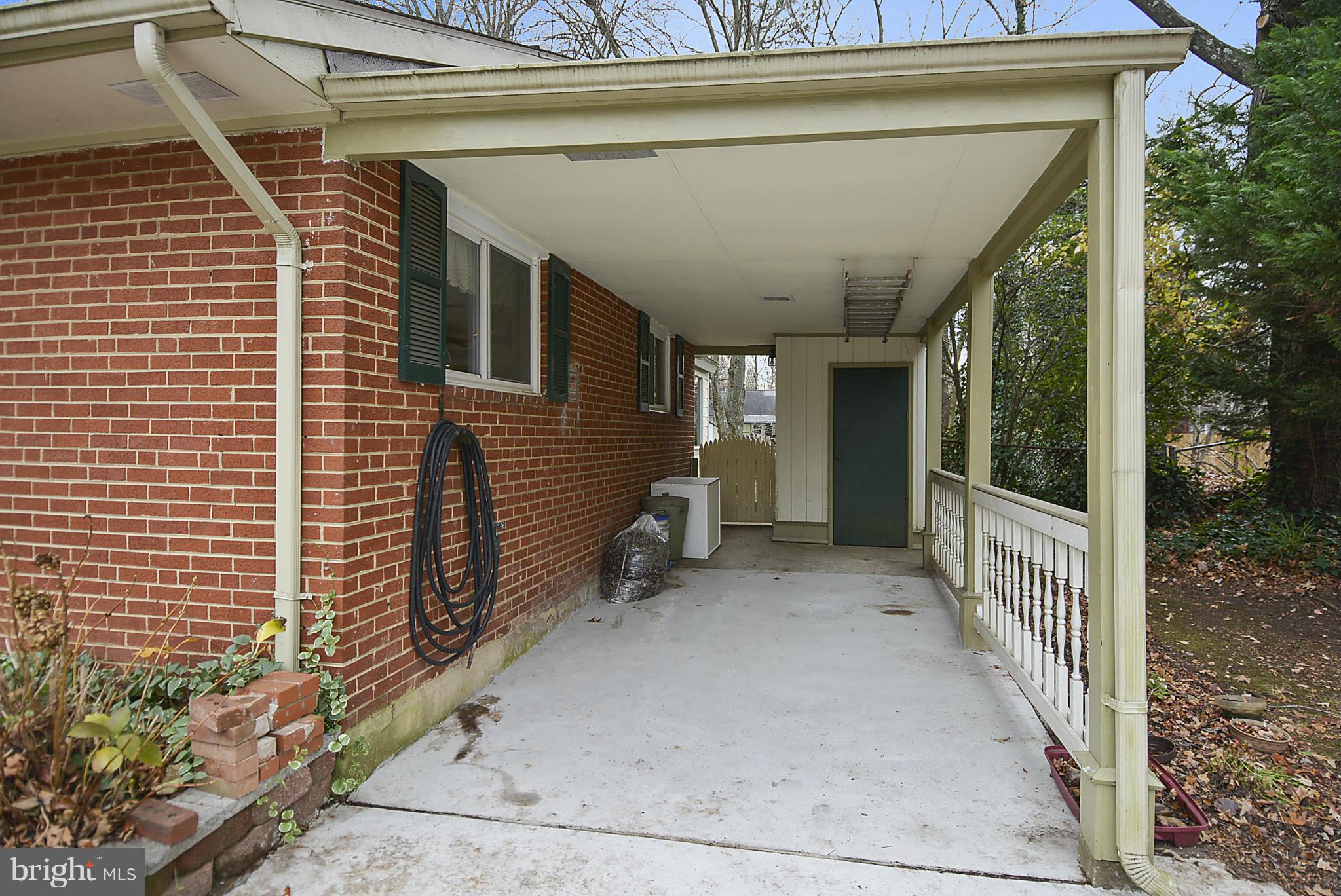 7405 Chatham Street Springfield, VA 22151 - Photo 3 of 30 a view of a porch with furniture