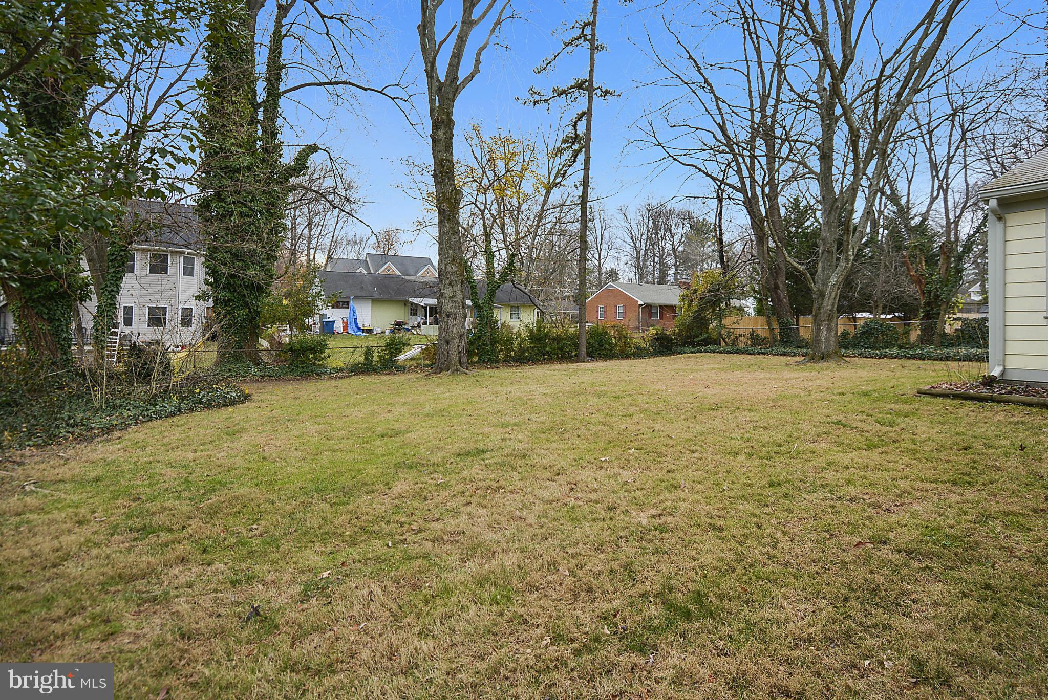 7405 Chatham Street Springfield, VA 22151 - Photo 28 of 30 a view of a field with large trees