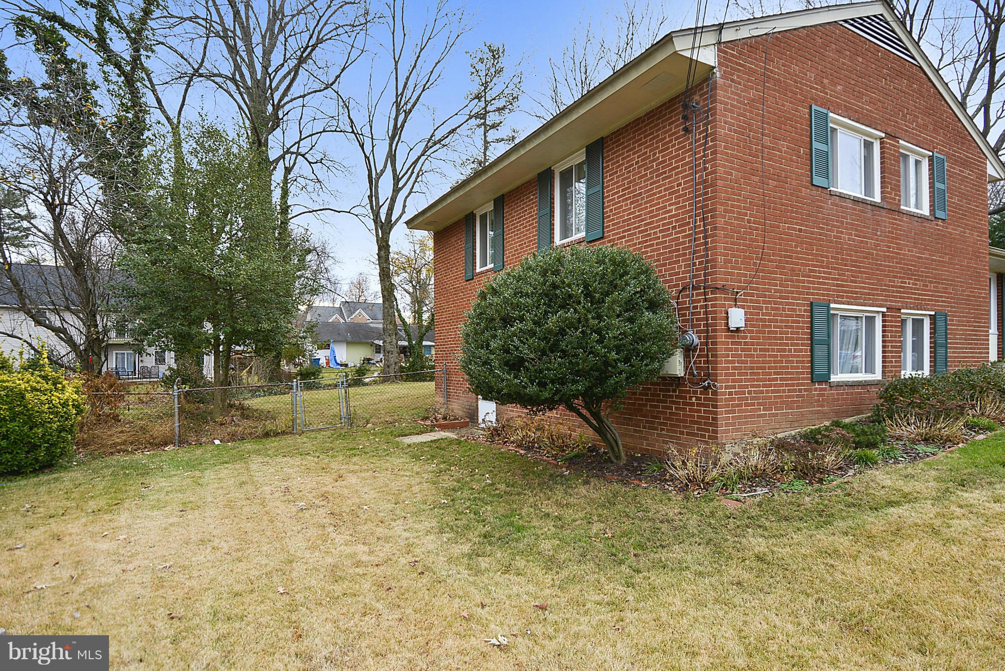 7405 Chatham Street Springfield, VA 22151 - Photo 29 of 30 a backyard of a house with table and chairs