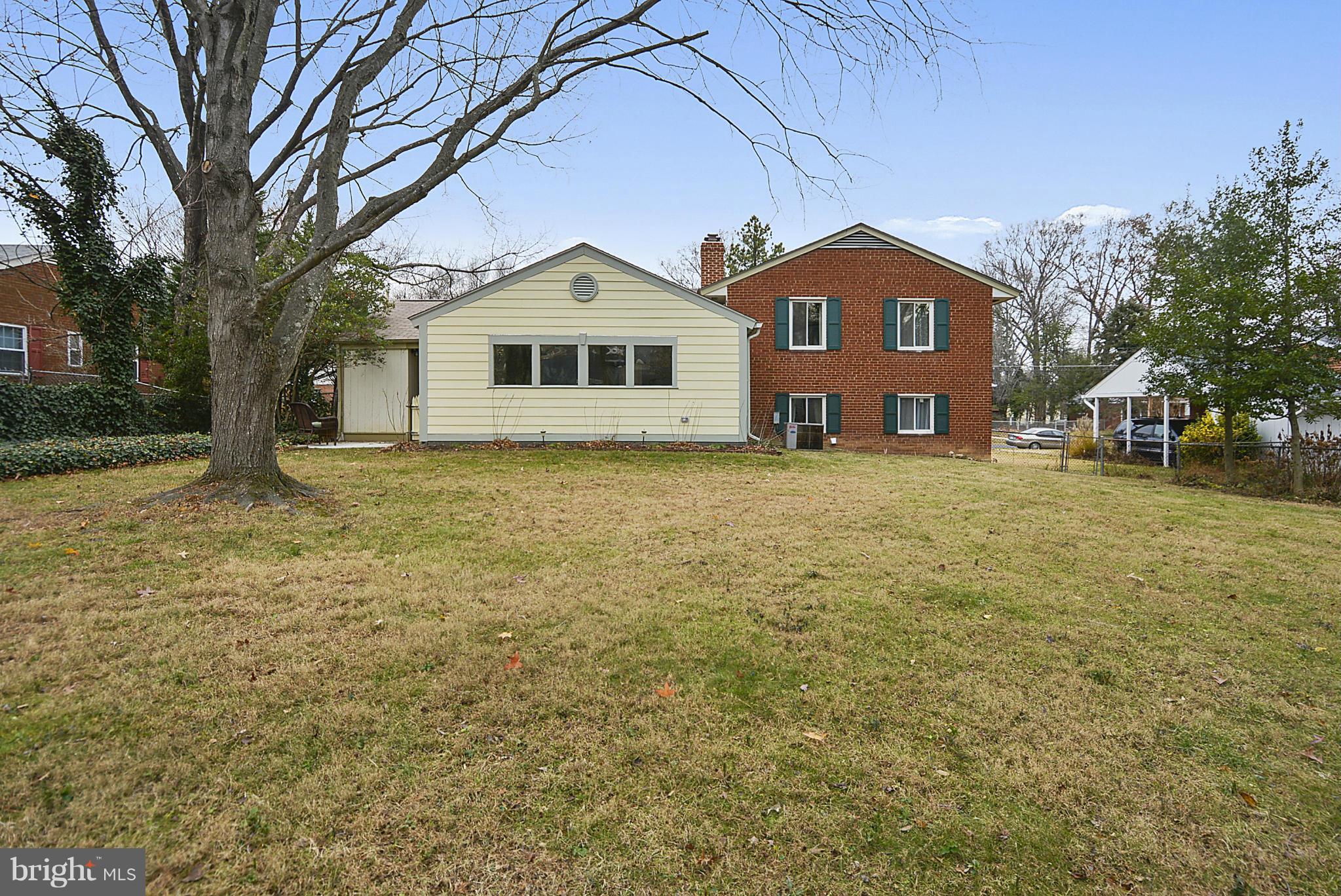 7405 Chatham Street Springfield, VA 22151 - Photo 30 of 30 a front view of a house with a yard