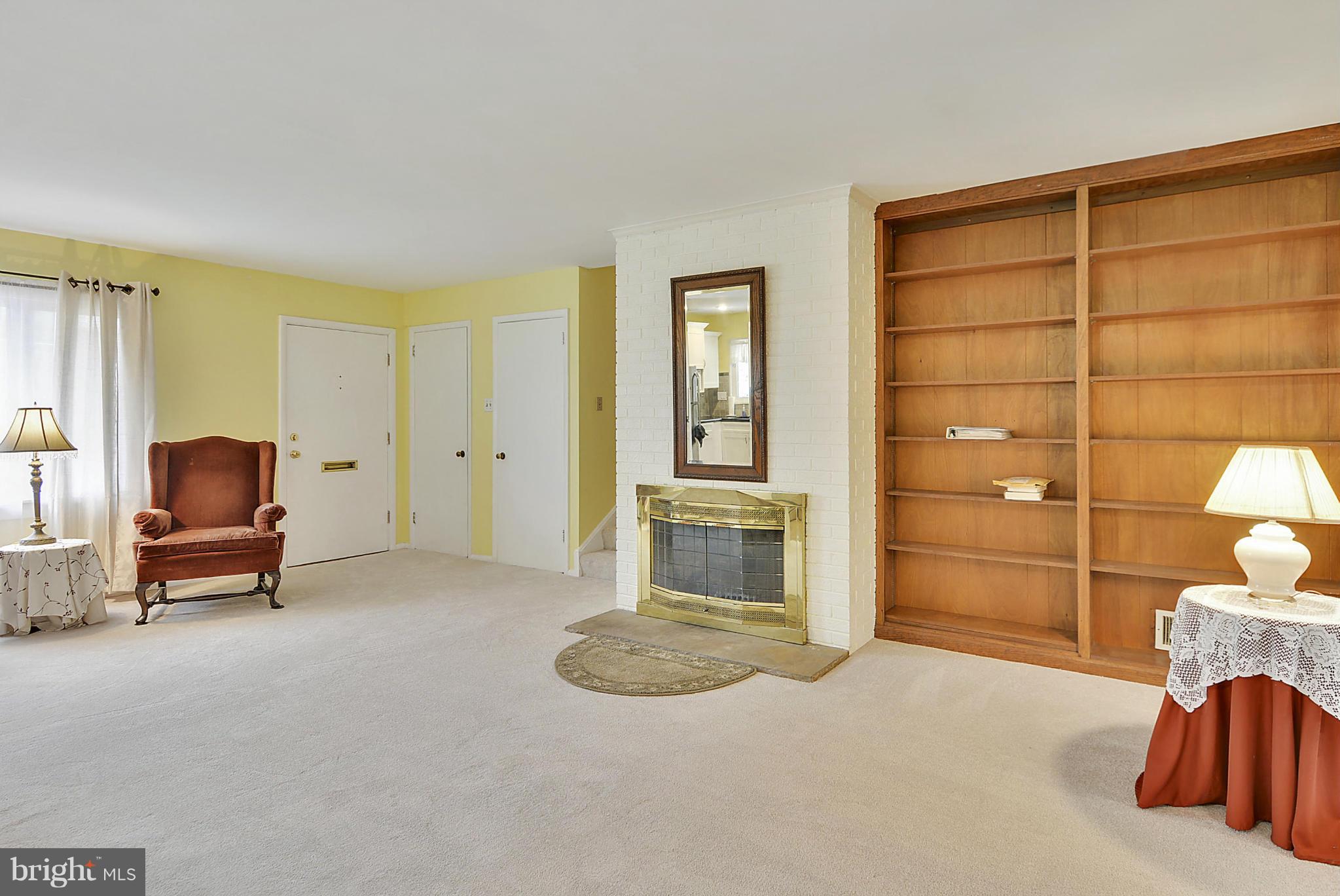 7405 Chatham Street Springfield, VA 22151 - Photo 10 of 30 a bedroom with furniture and a chair