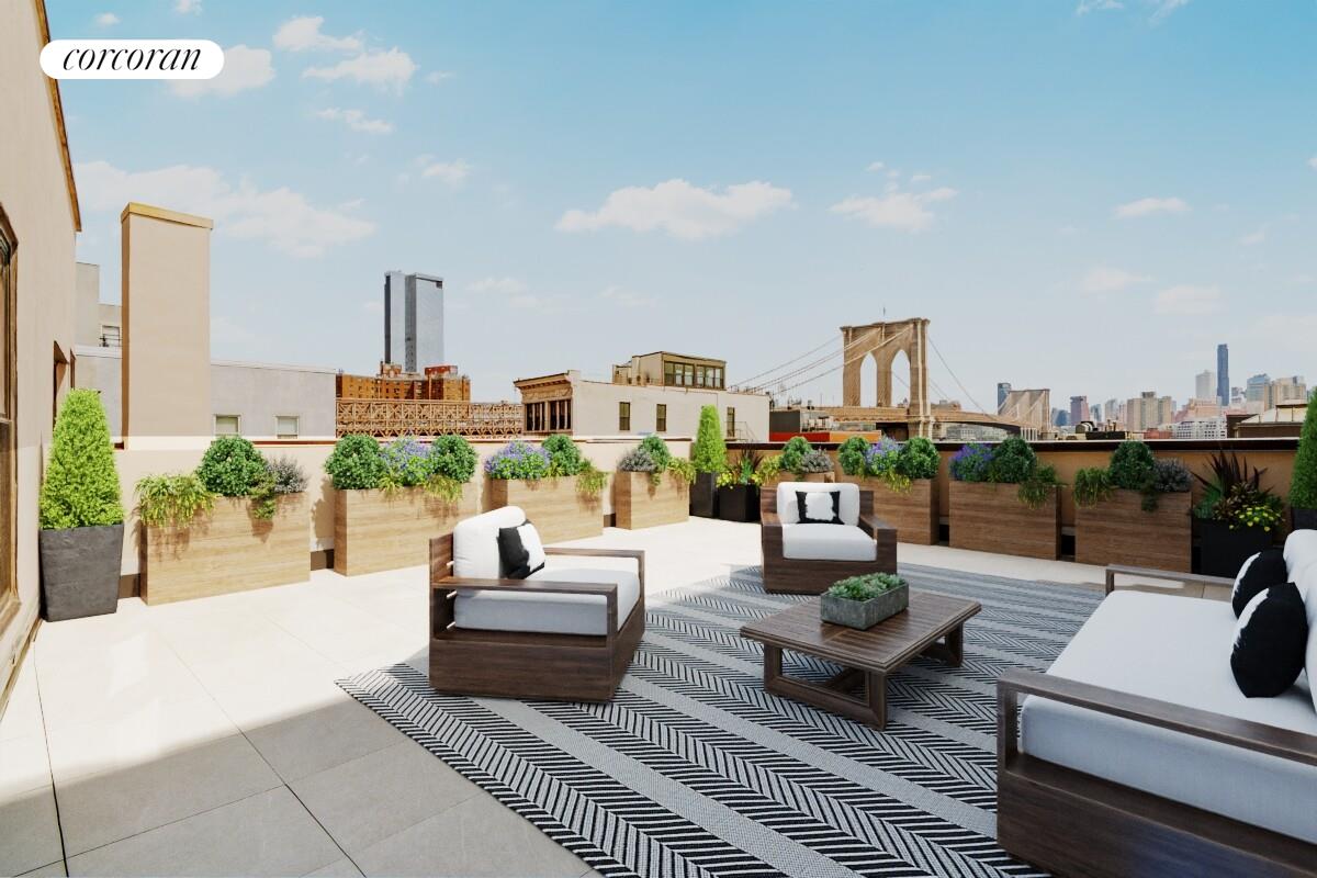 264 Water Street, Unit PHA Manhattan, NY 10038 - Photo 13 of 14 a roof deck with couch and a potted plant