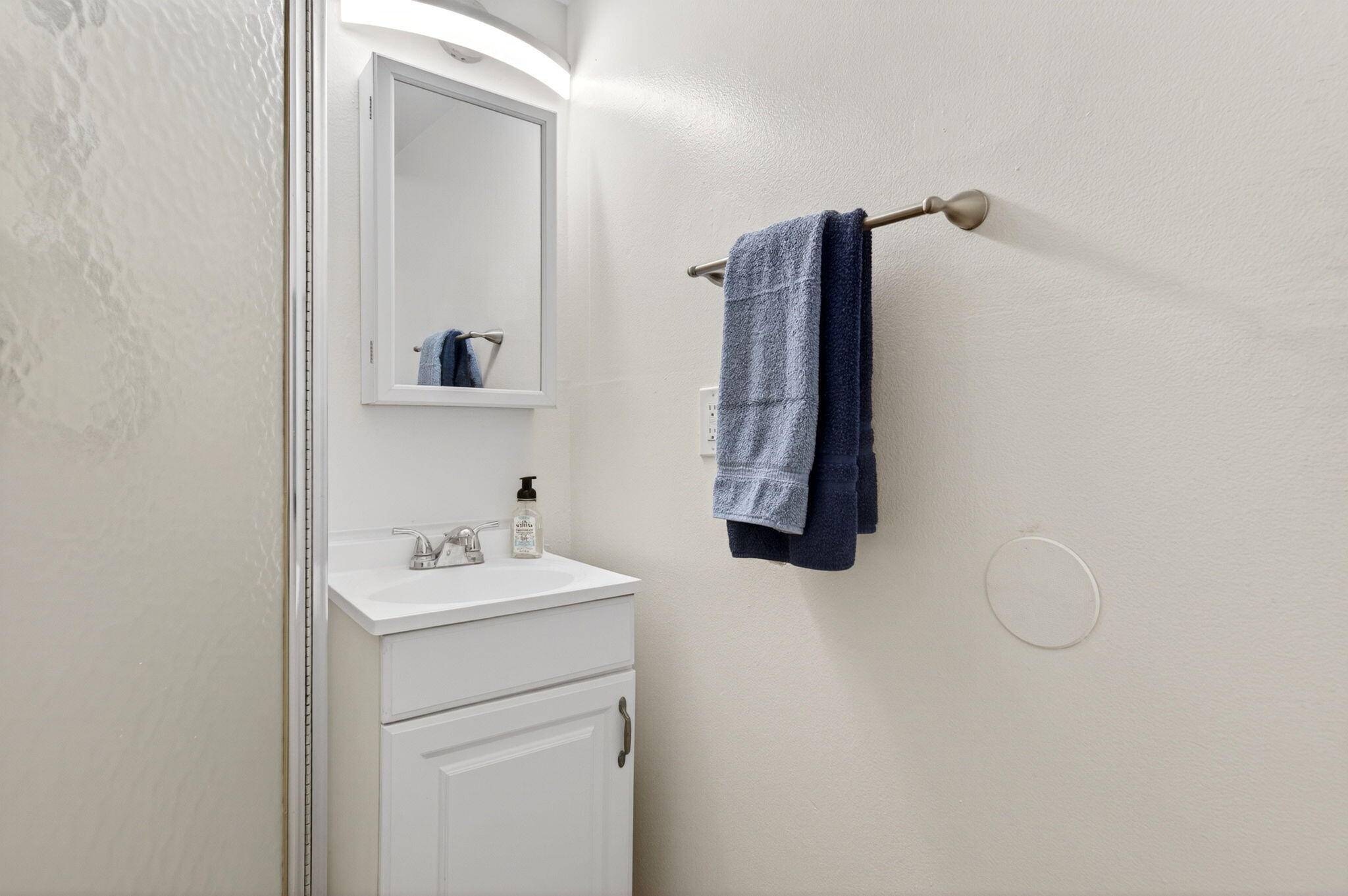 600 Southwest 2nd Avenue, Unit 240 Boca Raton, FL 33432 - Photo 23 of 54 a bathroom with a sink and a mirror