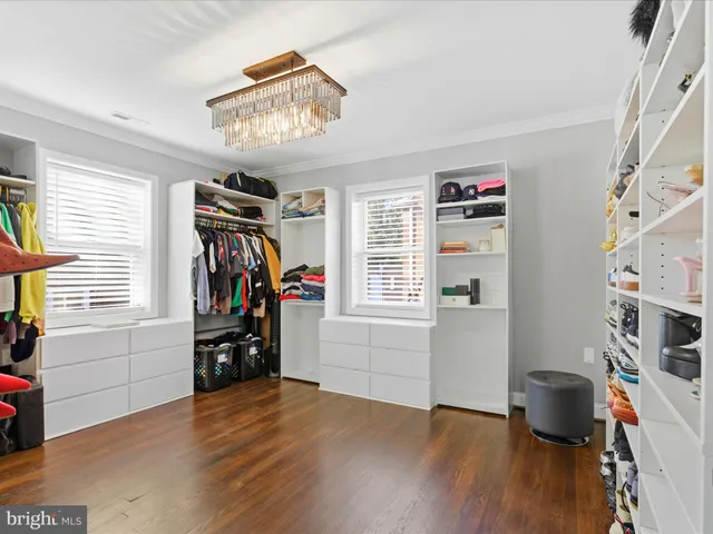 a view of a livingroom with furniture and a window