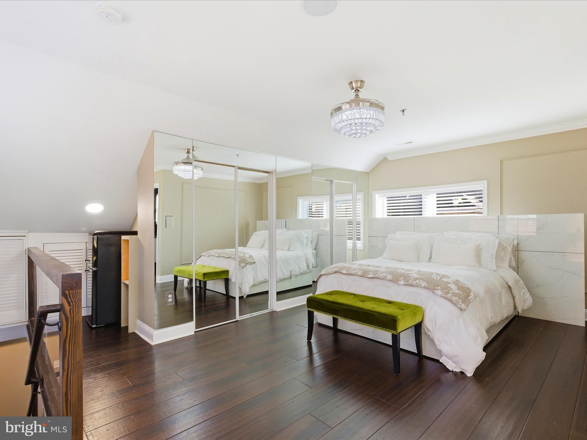 2717 Branch Avenue Southeast Washington, DC 20020 - Photo 27 of 51 a bedroom with furniture and a wooden floor