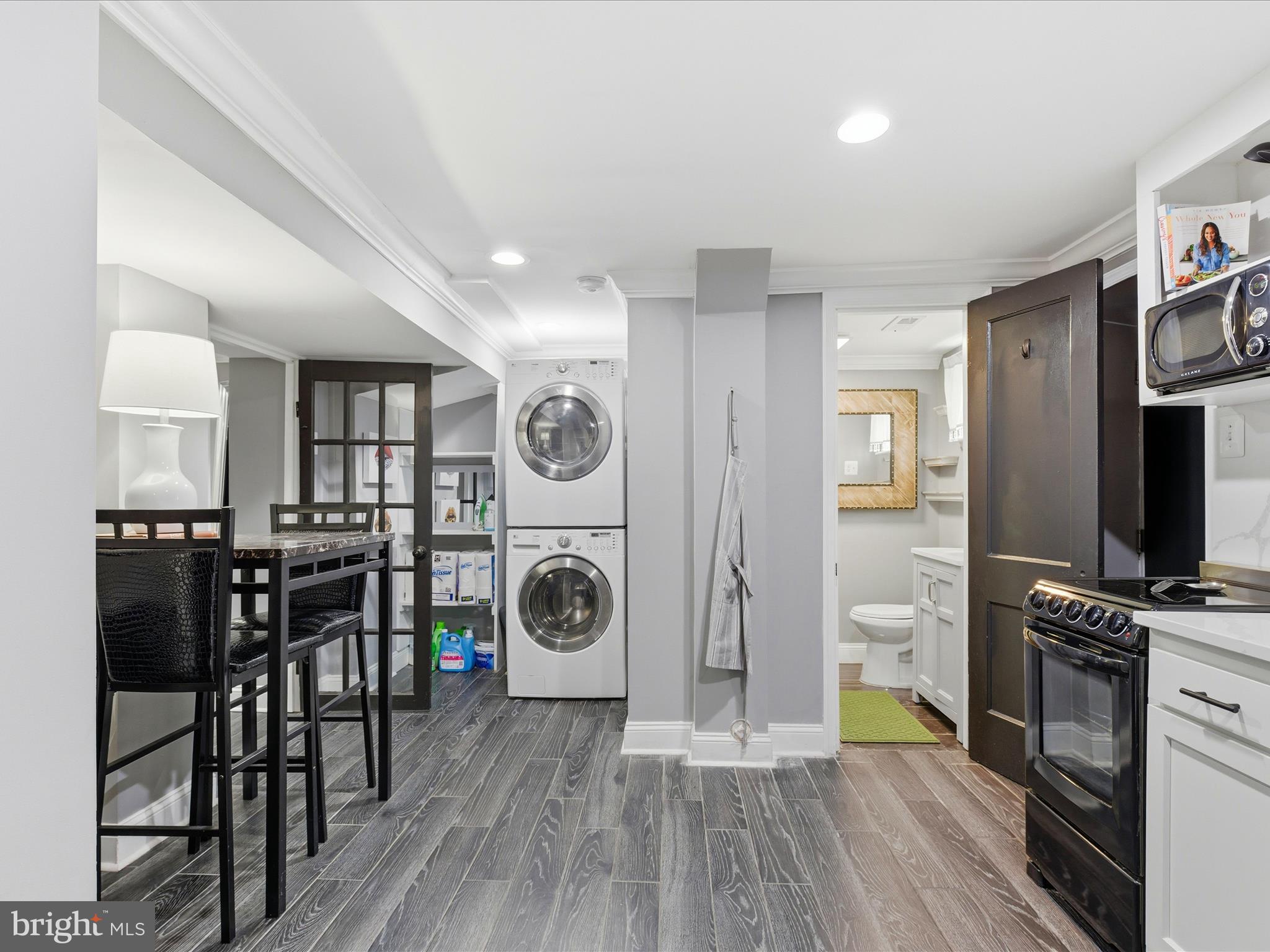 2717 Branch Avenue Southeast Washington, DC 20020 - Photo 35 of 51 a living room with furniture and a flat screen tv
