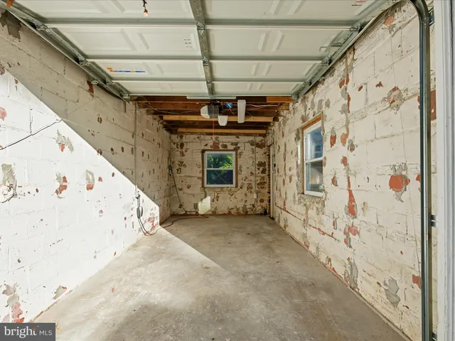 a view of a chairs and table in the patio