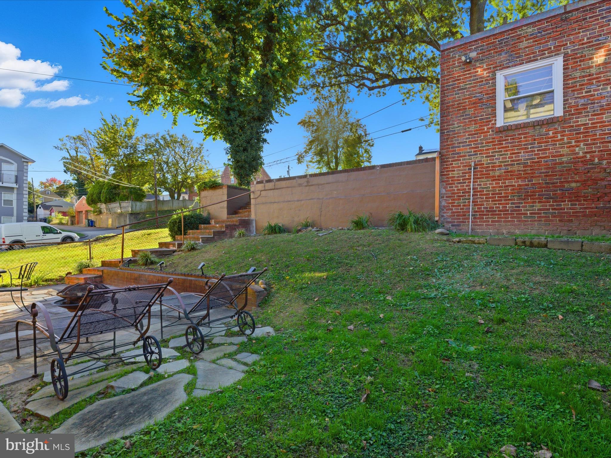 2717 Branch Avenue Southeast Washington, DC 20020 - Photo 44 of 51 a view of a patio with table and chairs and potted plants