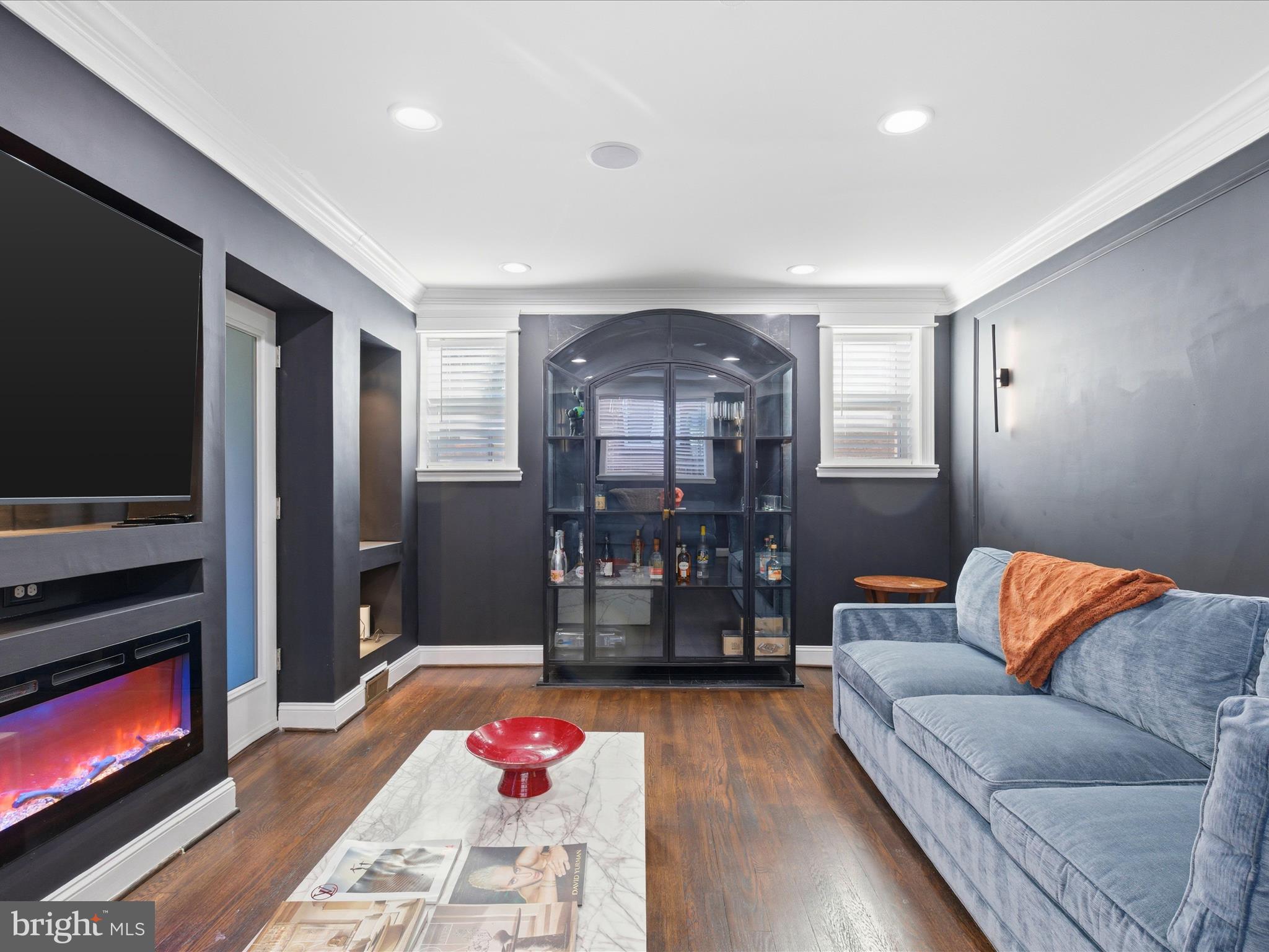 2717 Branch Avenue Southeast Washington, DC 20020 - Photo 6 of 51 a living room with furniture and flat screen tv