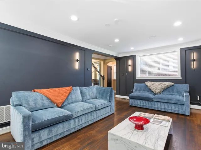 a living room with furniture and a couch