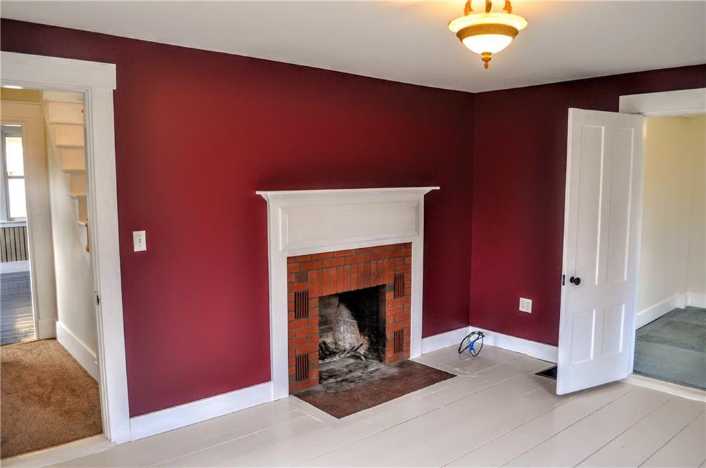 87 Back Road Abbot, ME 04406 - Photo 10 of 35 Bedroom or living room with an...