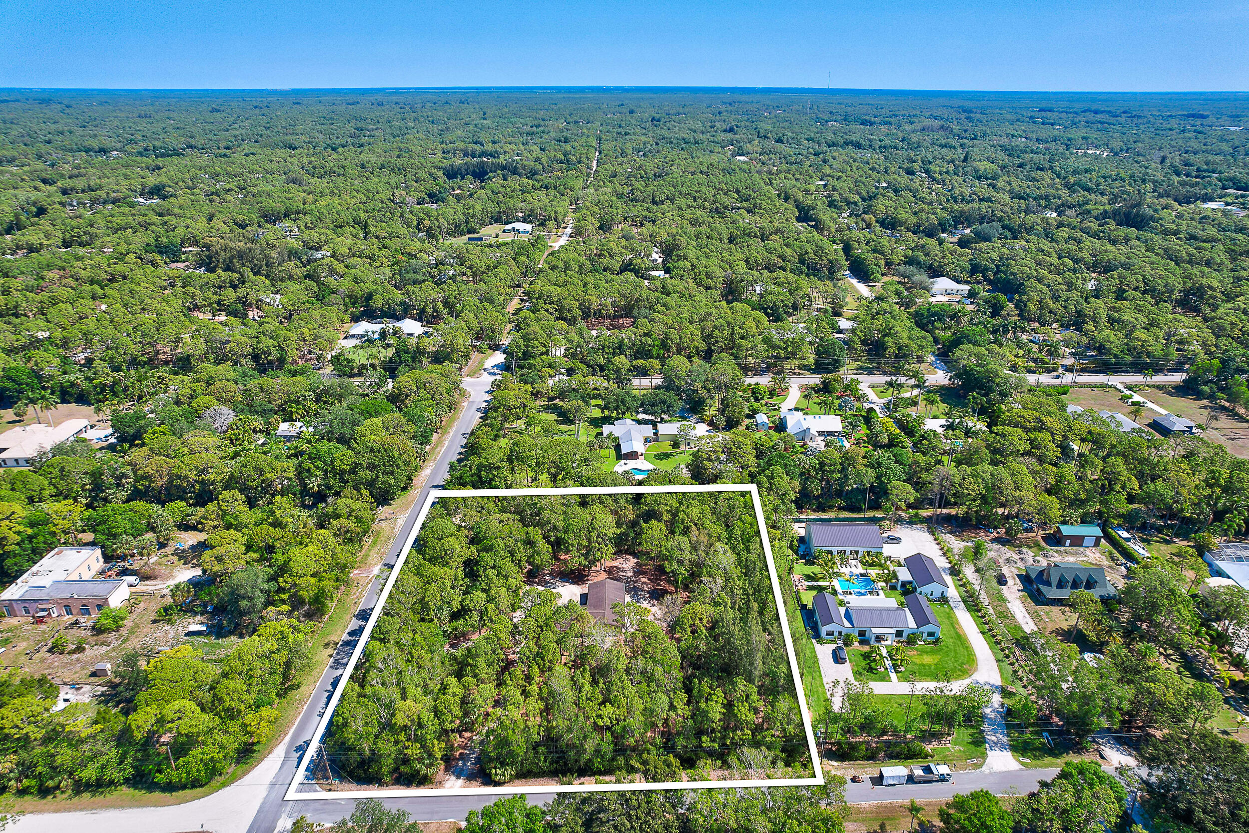 11473 154th Road North Jupiter, FL 33478 - Photo 8 of 24 Paved Roads x2 to Driveways x2