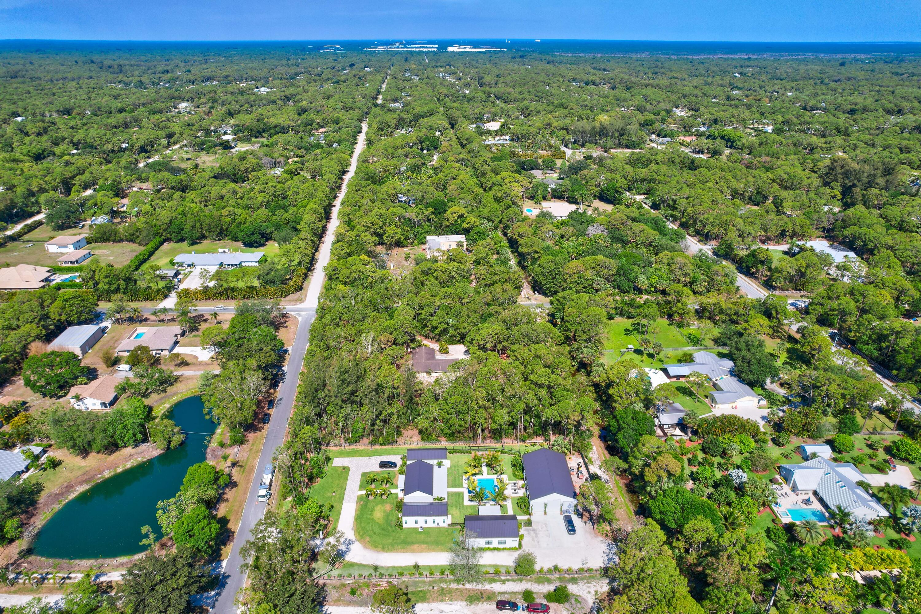 11473 154th Road North Jupiter, FL 33478 - Photo 9 of 24 Aerial looking West