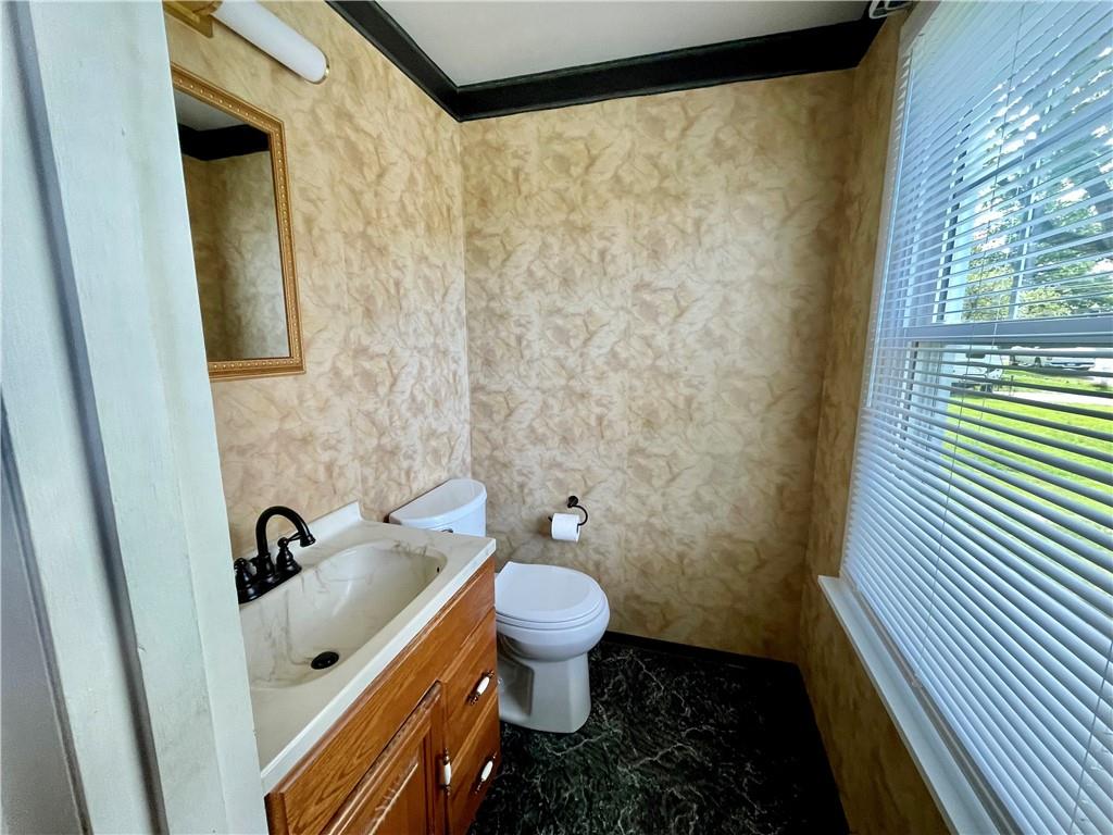 113 Newgate Drive Monaca, PA 15061 - Photo 11 of 18 a bathroom with a sink and a toilet