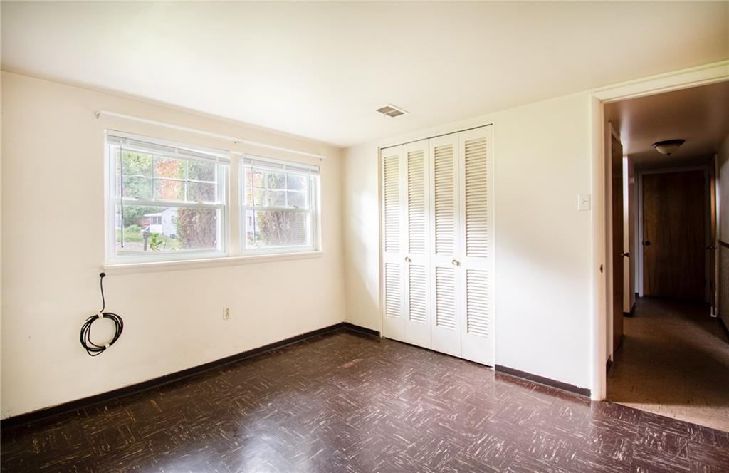 113 Newgate Drive Monaca, PA 15061 - Photo 14 of 18 an empty room with windows
