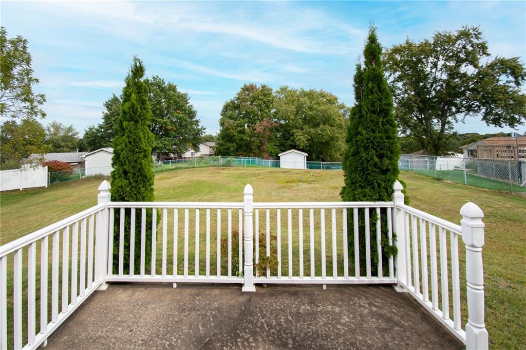 113 Newgate Drive Monaca, PA 15061 - Photo 16 of 18 a view of a wooden roof deck
