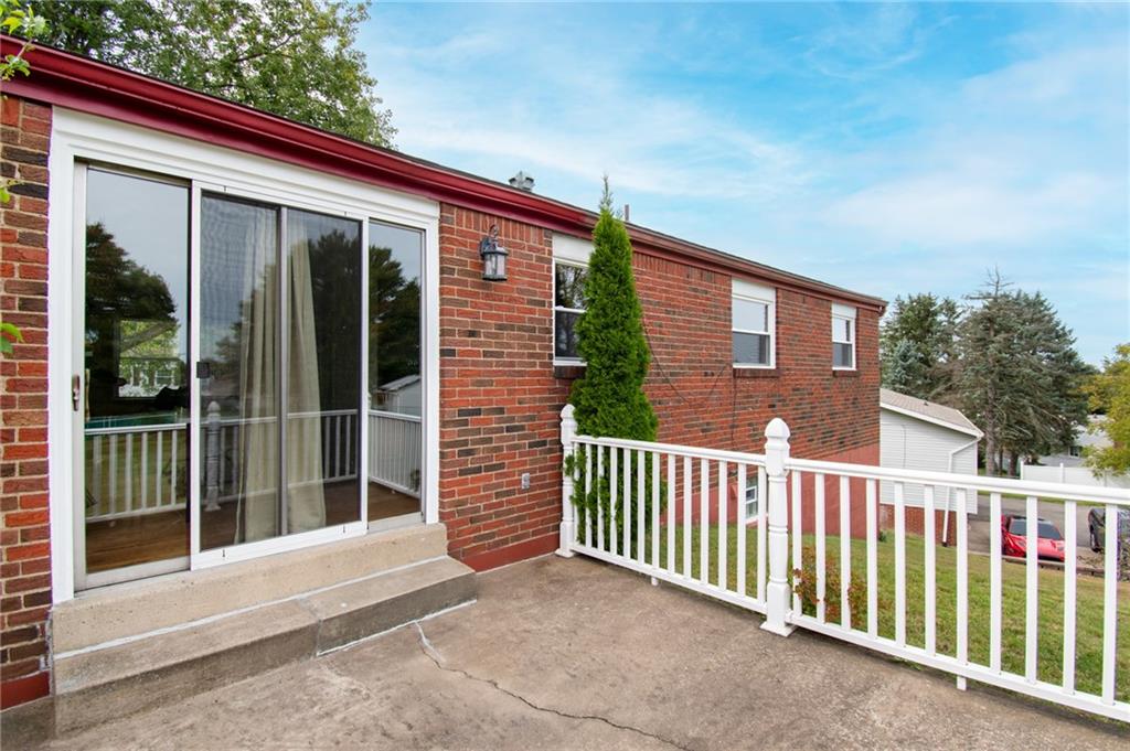 113 Newgate Drive Monaca, PA 15061 - Photo 17 of 18 a view of a house with a porch