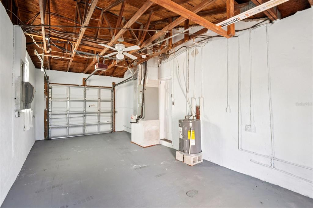 410 Virginia Avenue Madeira Beach, FL 33708 - Photo 24 of 25 a view of empty room with wooden walls