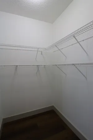 a view of a room with racks on the wall