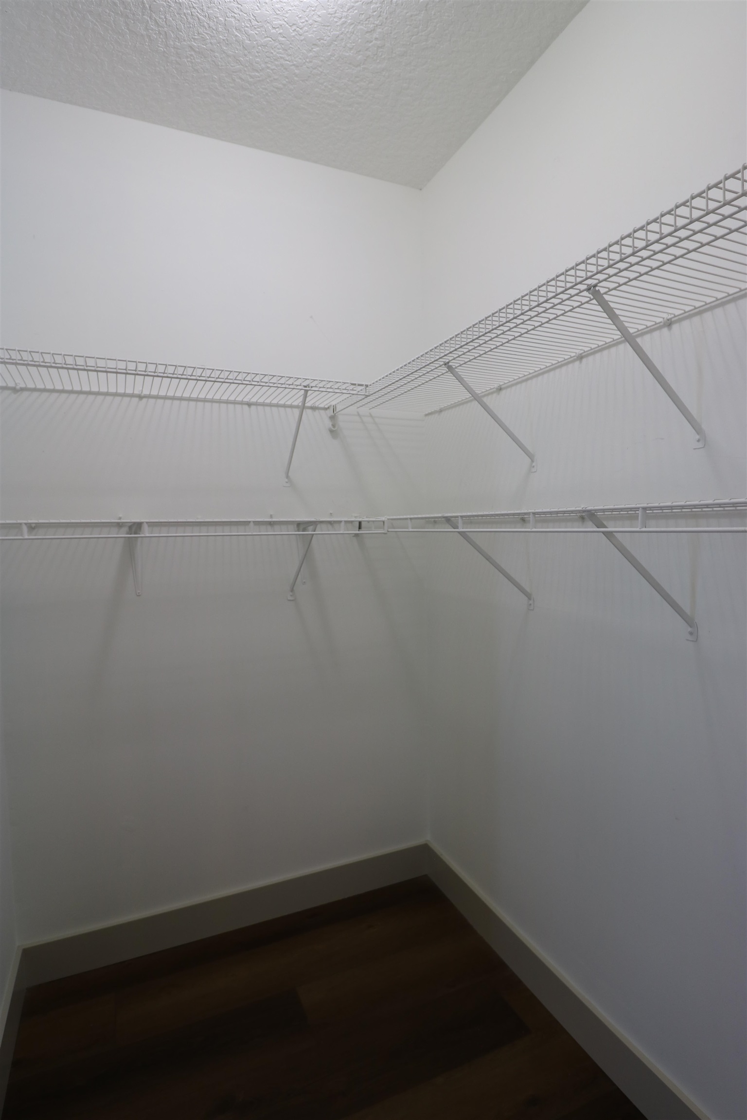 613 Augusta Circle St. Augustine, FL 32086 - Photo 13 of 26 a view of a room with racks on the wall