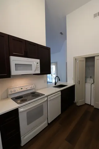 a kitchen with a stove and a microwave