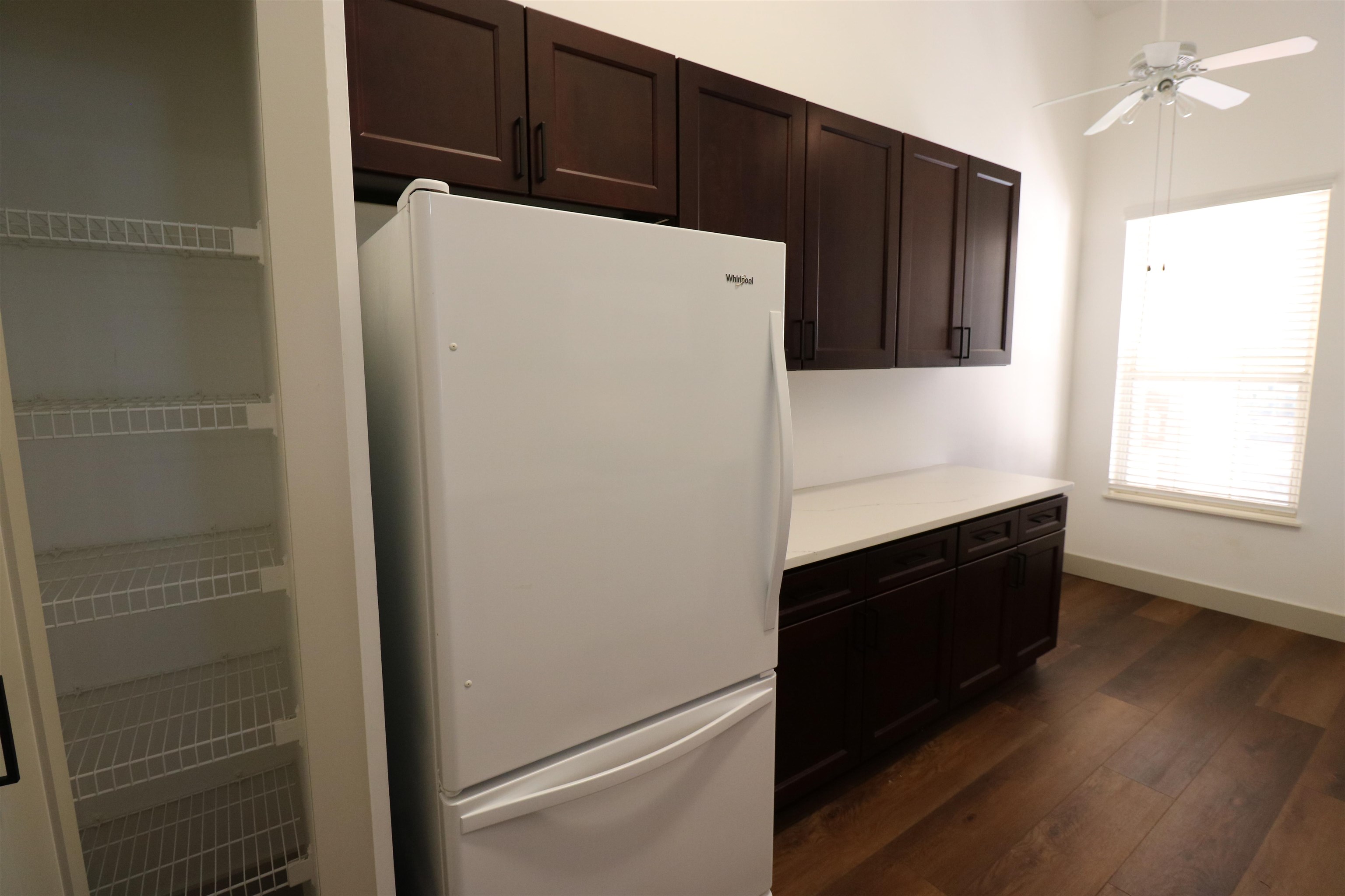 613 Augusta Circle St. Augustine, FL 32086 - Photo 8 of 26 a utility room with wooden floor washer and dryer