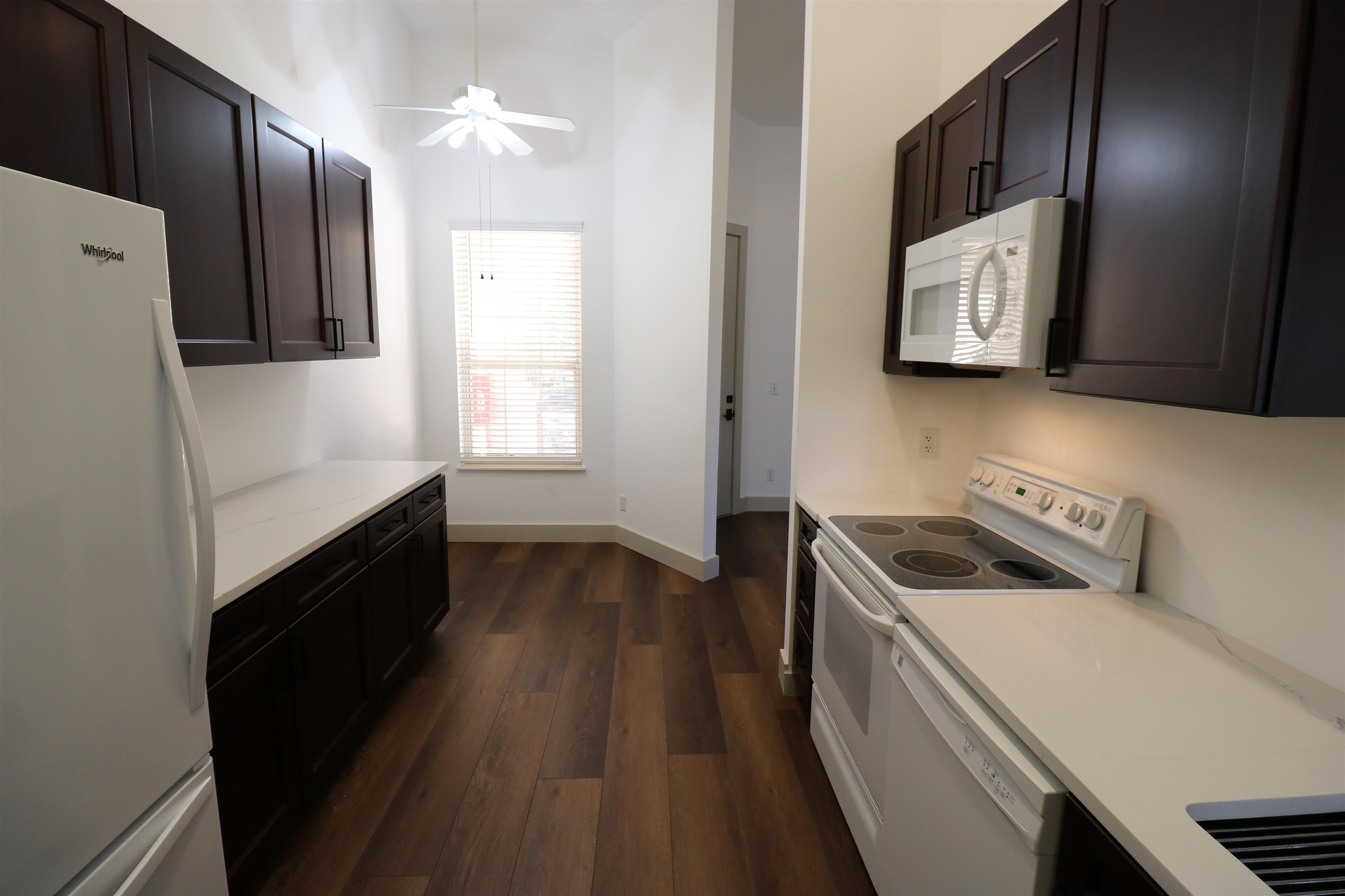 613 Augusta Circle St. Augustine, FL 32086 - Photo 9 of 26 a kitchen with a stove and a refrigerator