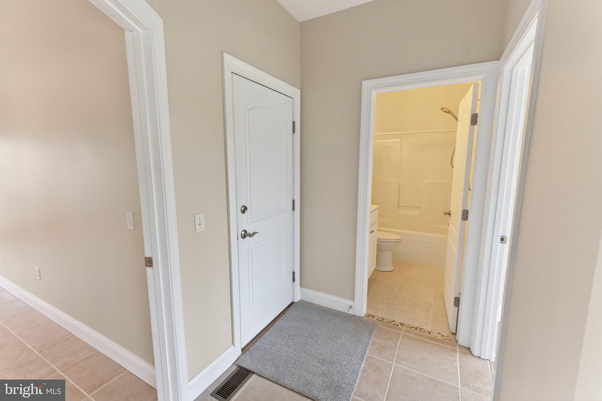 34029 Peppers Corner Road Millville, DE 19967 - Photo 16 of 101 Inviting entryway with modern touches.