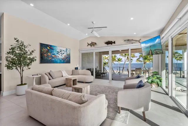 a outdoor space with lots of tables a garden and chairs