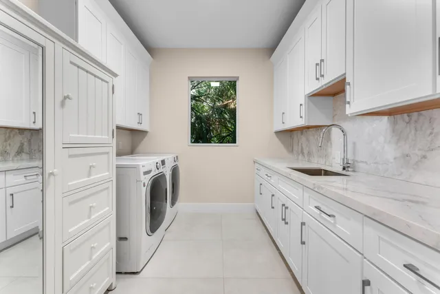 a view of a lake with a bench and wooden floor