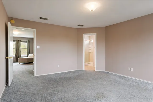 a view of a room with a bathroom