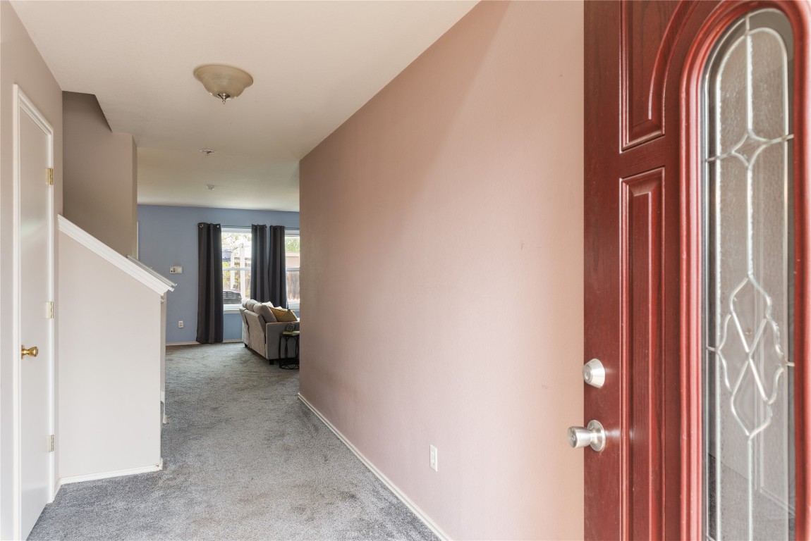 1329 Amberwood Loop Kyle, TX 78640 - Photo 6 of 25 a view of a livingroom with furniture and stairs