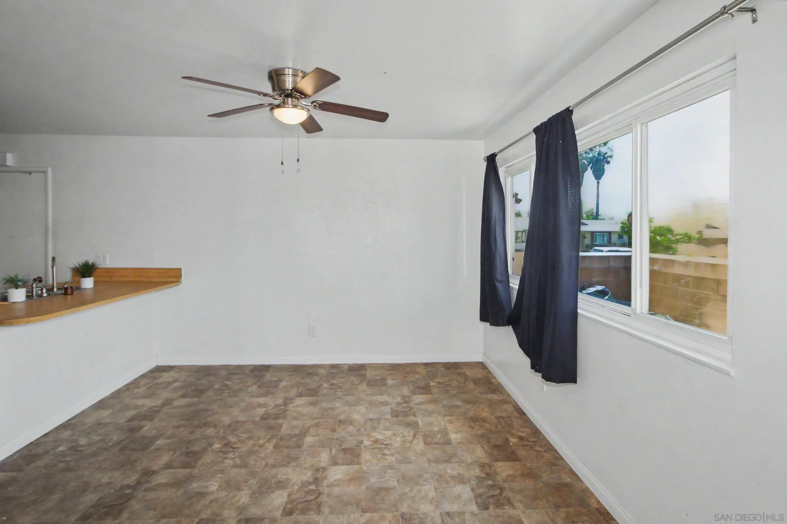 8766 Kelso Street Spring Valley, CA 91977 - Photo 13 of 44 a view of an empty room with a window