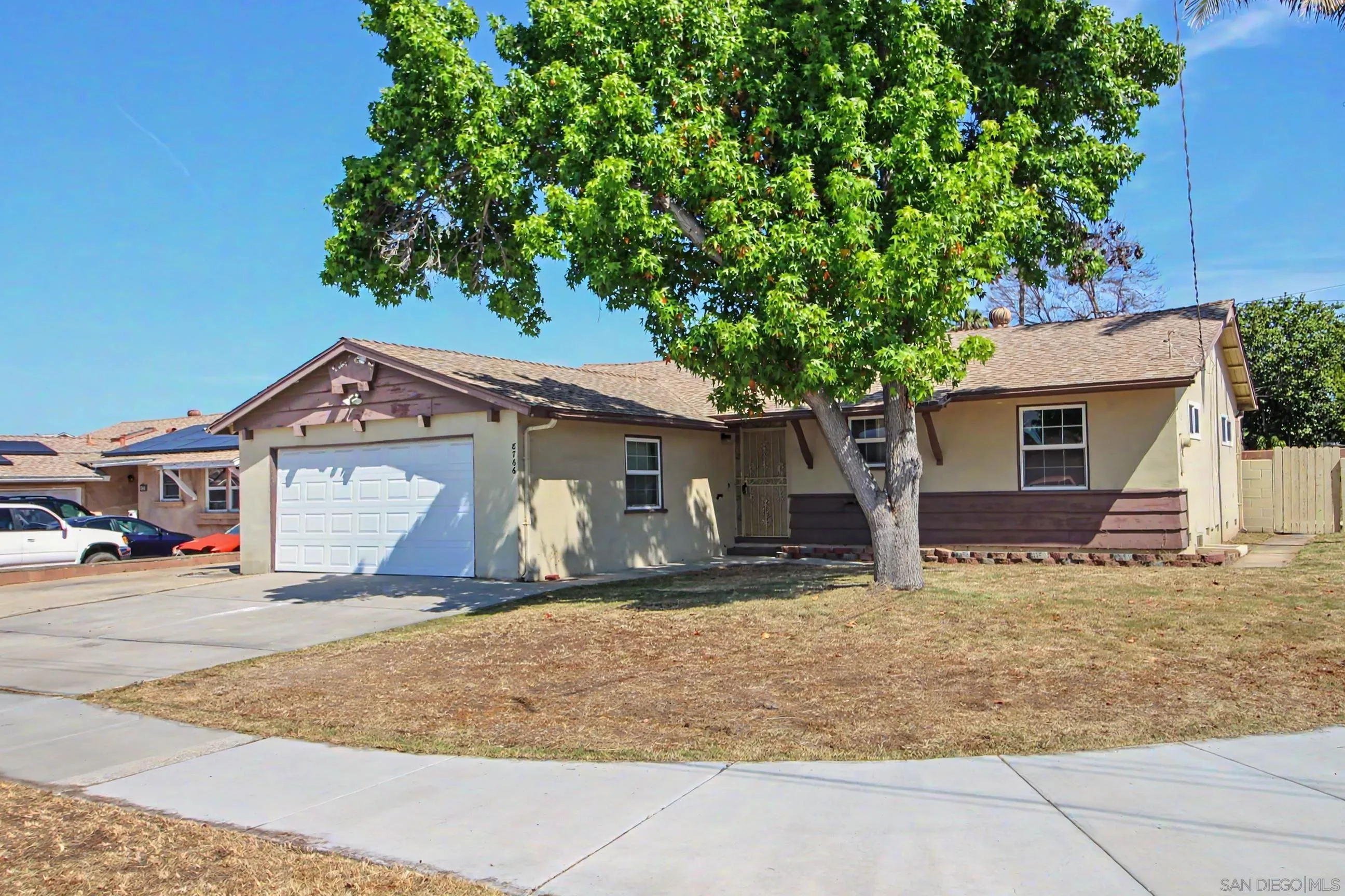 8766 Kelso Street Spring Valley, CA 91977 - Photo 4 of 44 a view of a house with a tree in front of it
