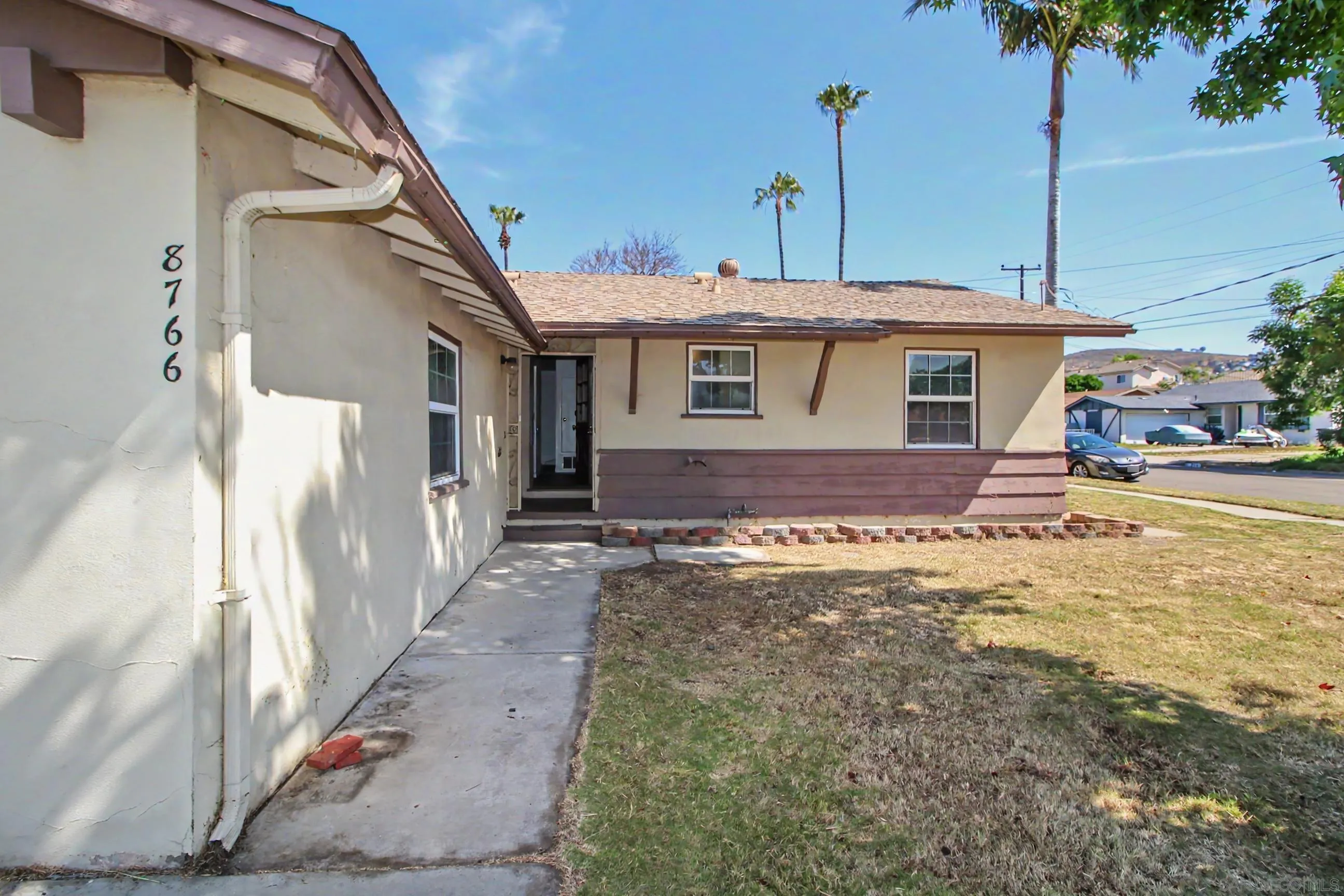 8766 Kelso Street Spring Valley, CA 91977 - Photo 7 of 44 a view of a house with a yard