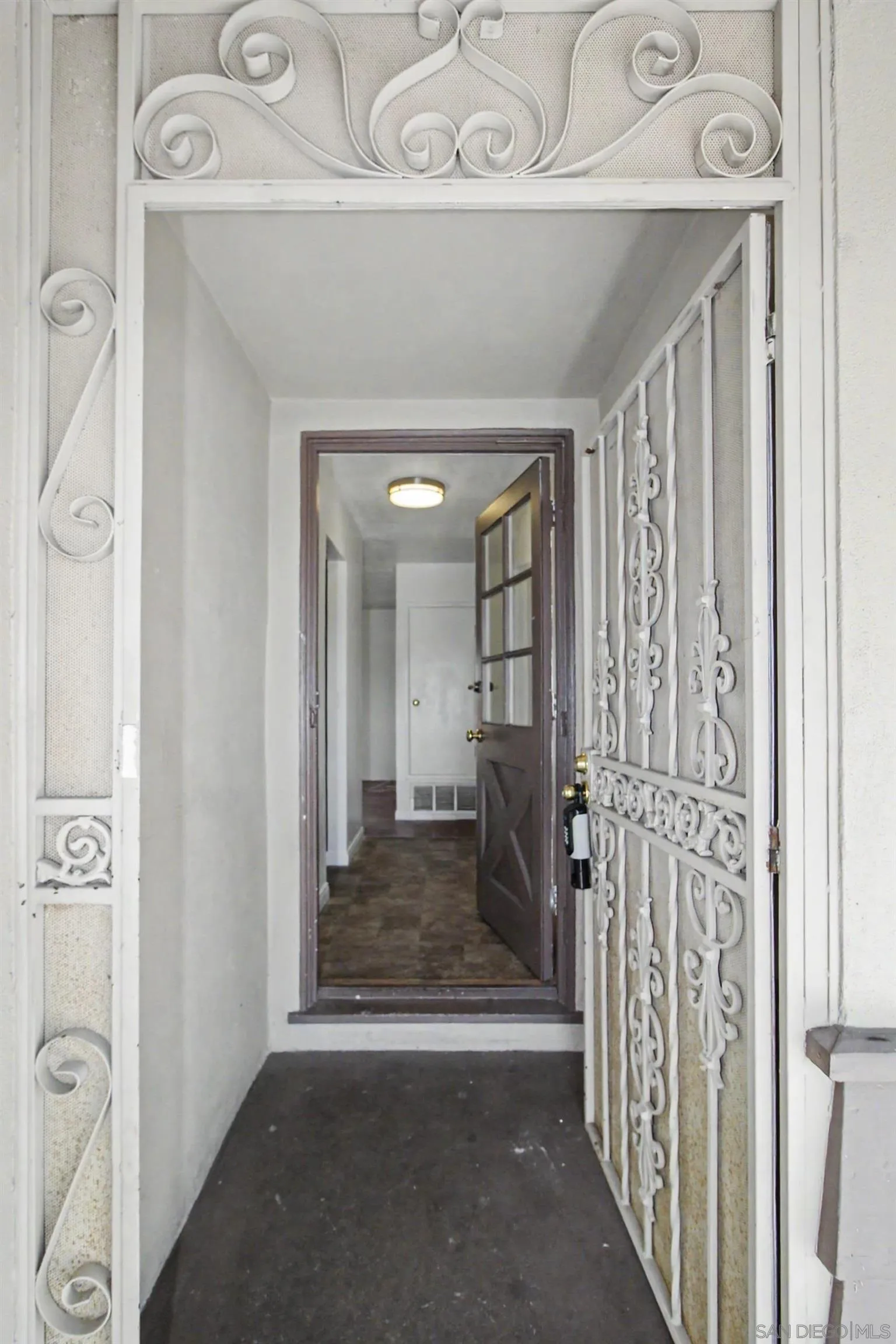 8766 Kelso Street Spring Valley, CA 91977 - Photo 8 of 44 a view of a hallway with a dining area