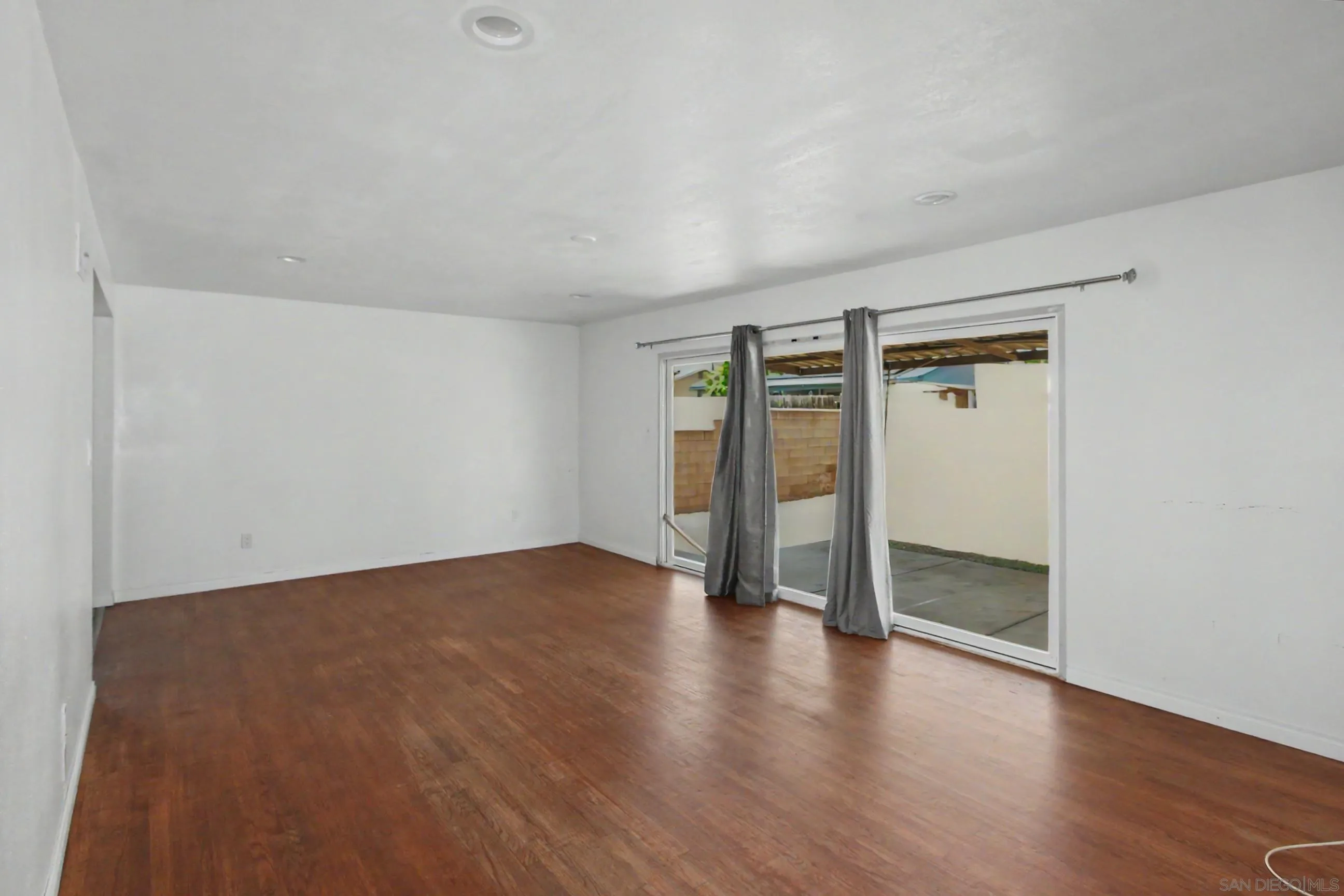 8766 Kelso Street Spring Valley, CA 91977 - Photo 10 of 44 wooden floor in an empty room