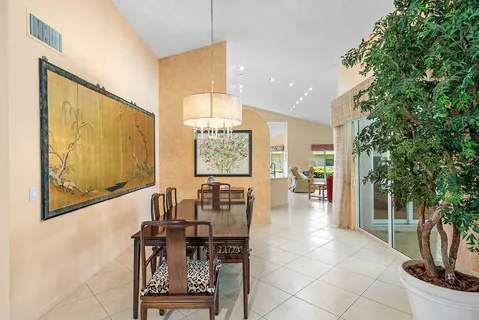 a view of a entryway with furniture and floor to ceiling window