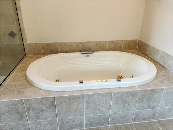 a view of a bathtub in a bathroom