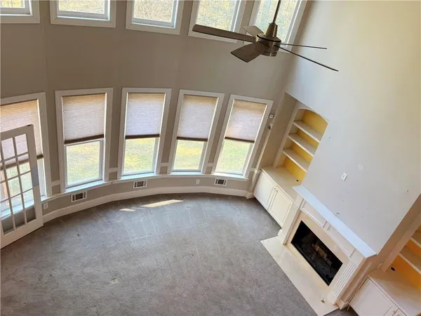 an empty room with windows