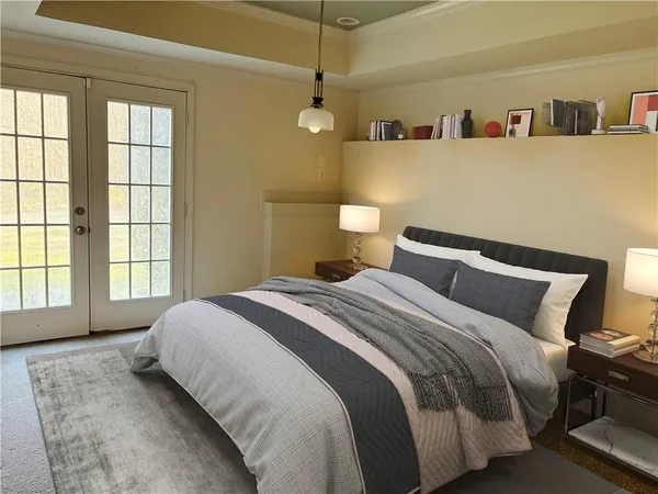 a bedroom with a bed and window