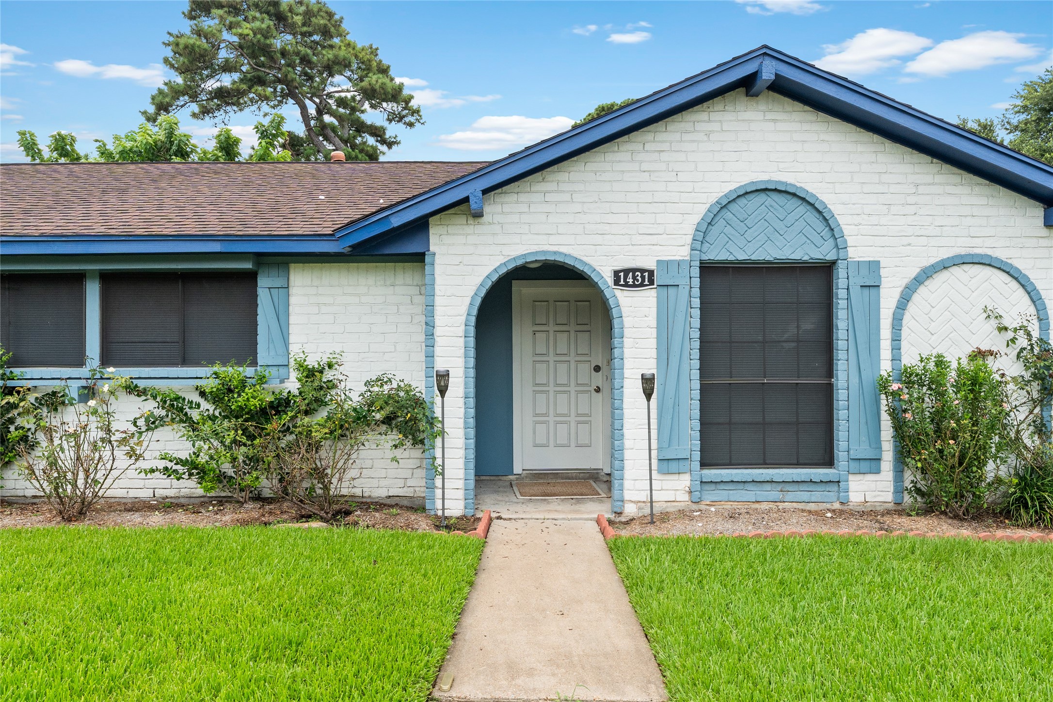 1431 Epsilon Street Pasadena, TX 77504 - Photo 1 of 21 a view of a house with garden