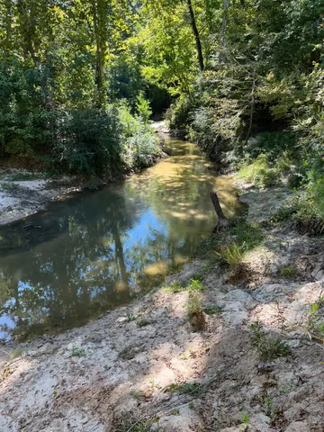 a view of outdoor space with lake view